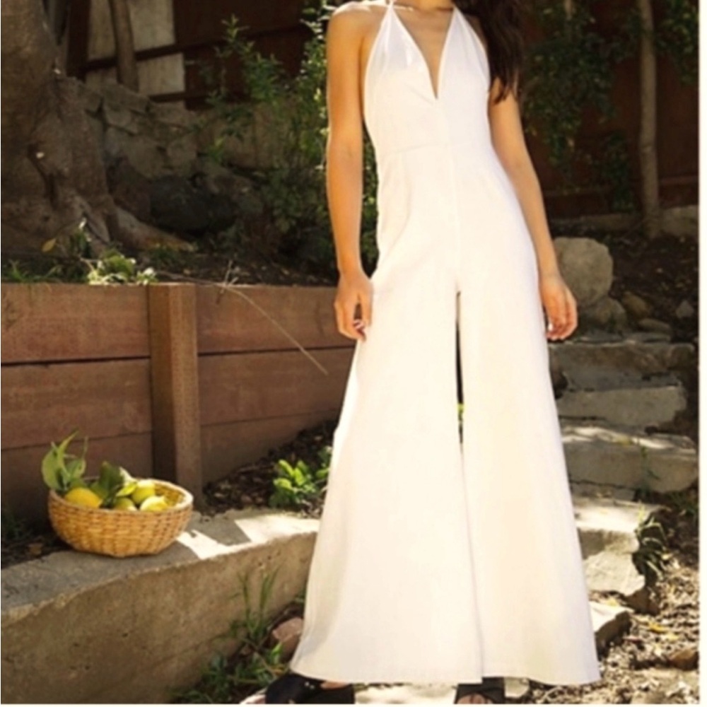 Free People white halter neck, open back, wide leg jumpsuit